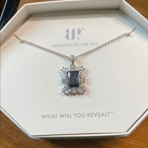 Sophisticated Silver and Black Necklace with Striking Pendant